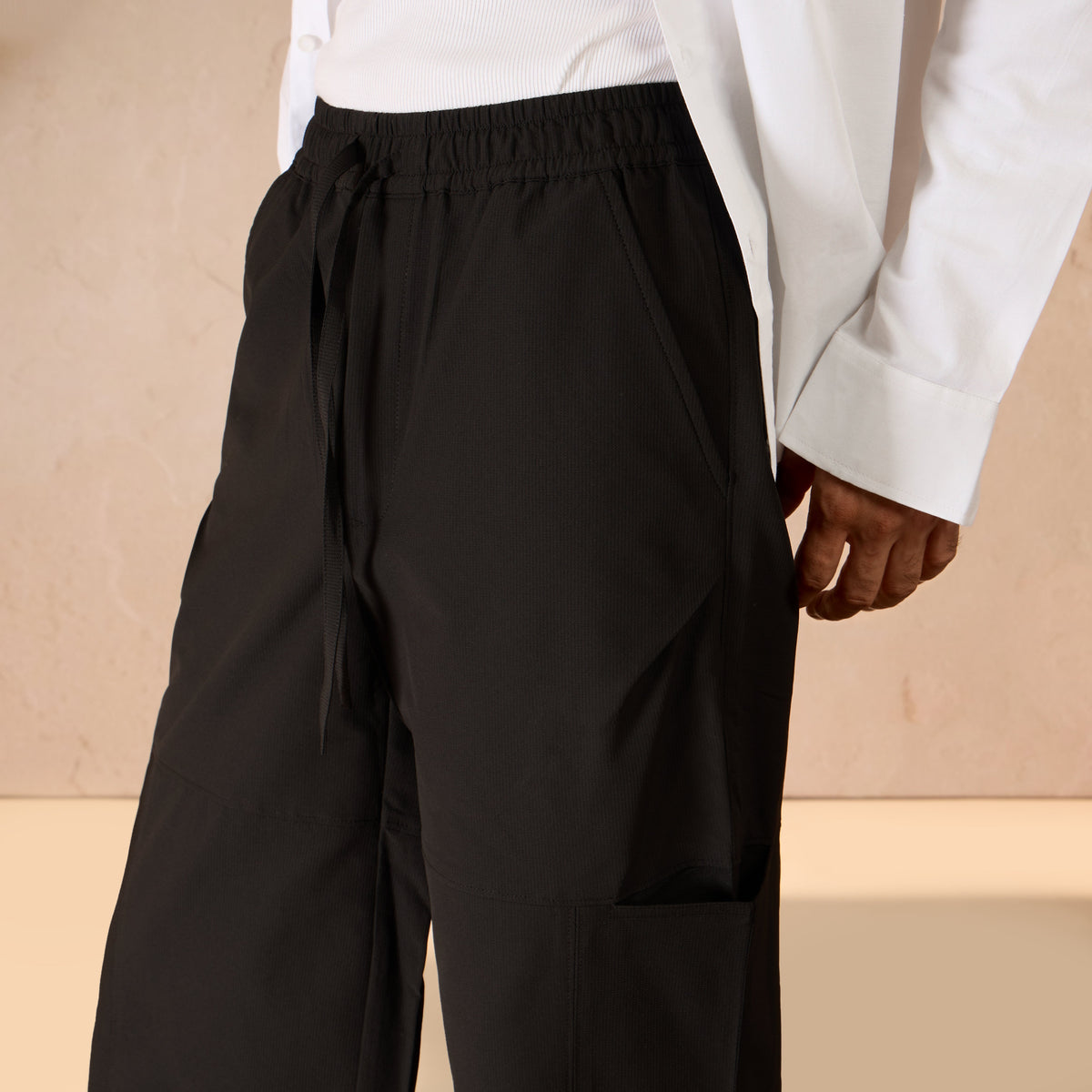 RELAXED FIT PARACHUTE TRACK PANT - BLACK by Warping Theories