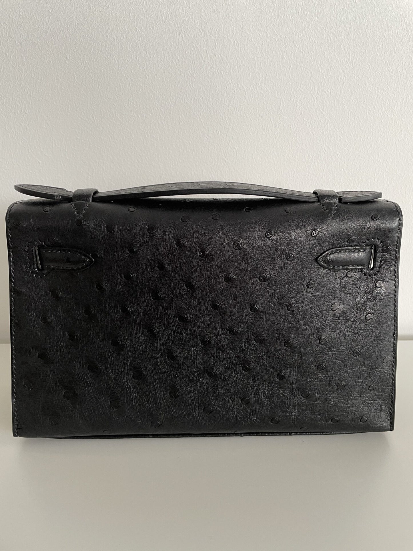 Hermès Kelly Pochette – Black Ostrich with Gold Hardware