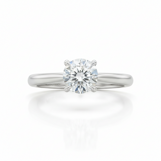TIFFANY & CO. Classic Prawn Platinum 0.34 Carat Solitaire Ring VVS-I: Timeless Luxury & Elegance