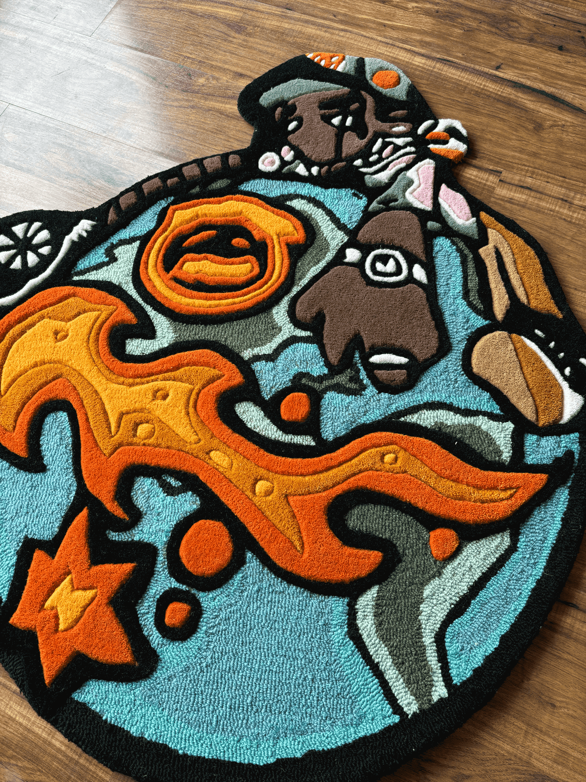 Travis world logo Rug by THE DRIP CO. RUGS
