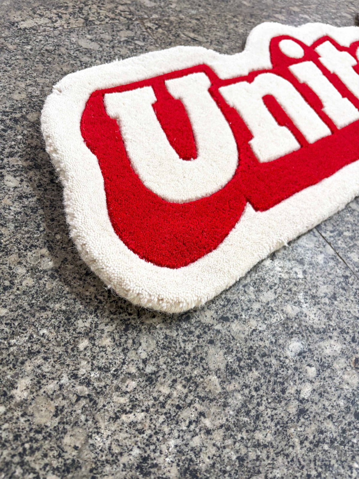 United fan art Hand Tufted Rug by THE DRIP CO. RUGS