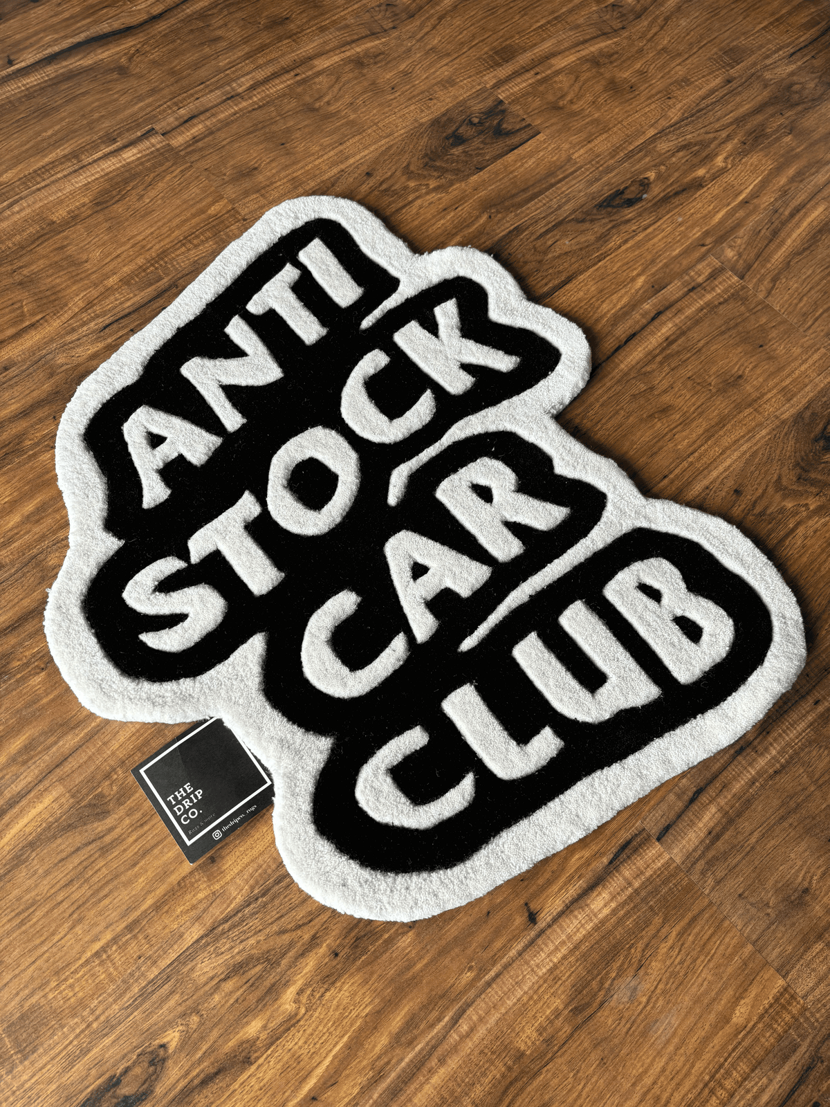 Anti Stock Car Club Hand Tufted Custom Rug by The Drip Co. by THE DRIP CO. RUGS