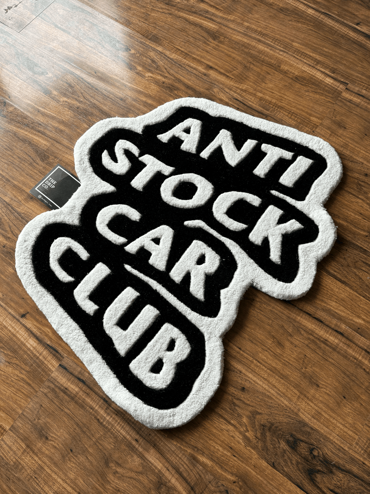 Anti Stock Car Club Hand Tufted Custom Rug by The Drip Co. by THE DRIP CO. RUGS