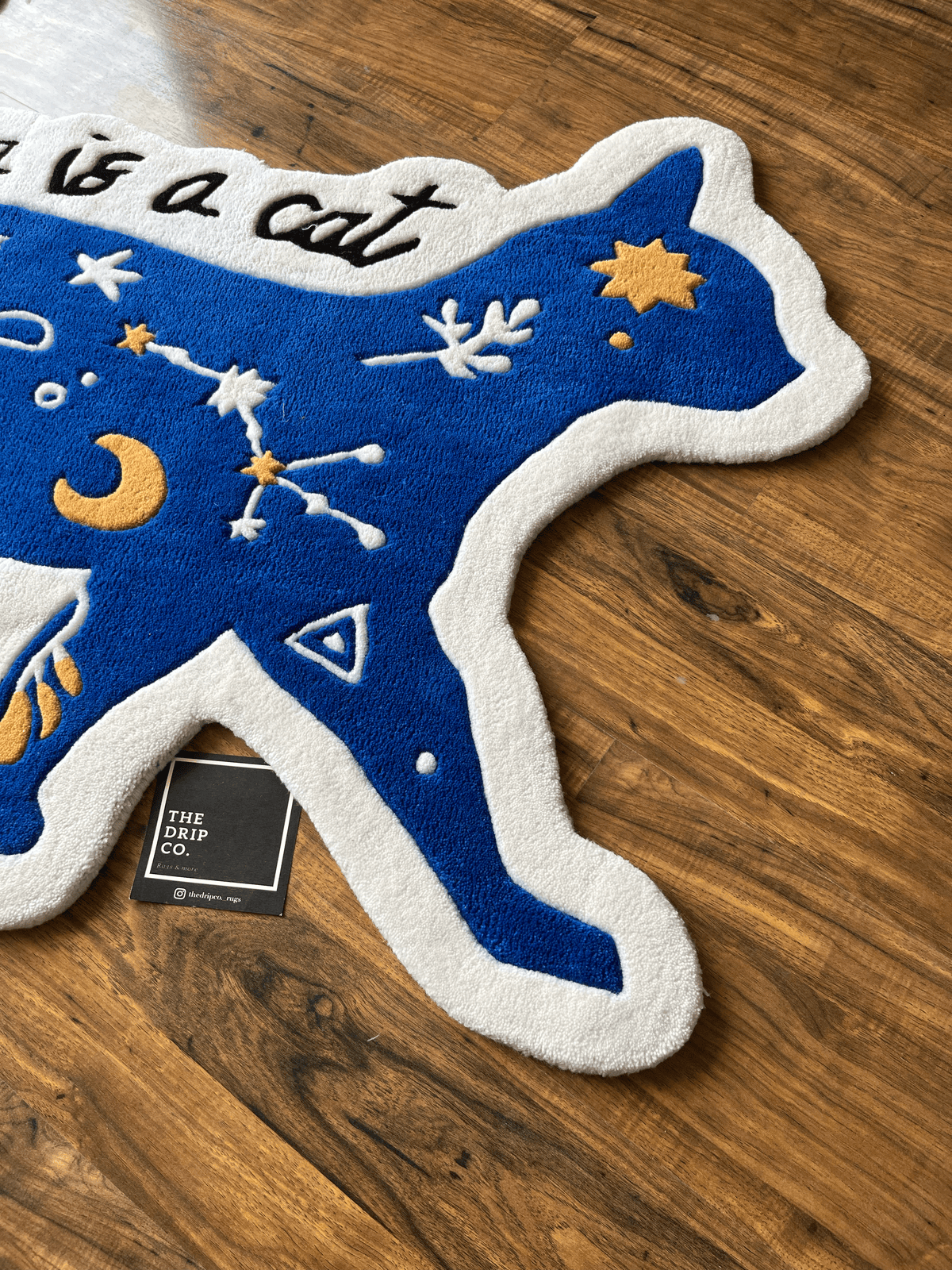 karma is a Cat hand tufted Custom Rug by The Drip Co. by THE DRIP CO. RUGS