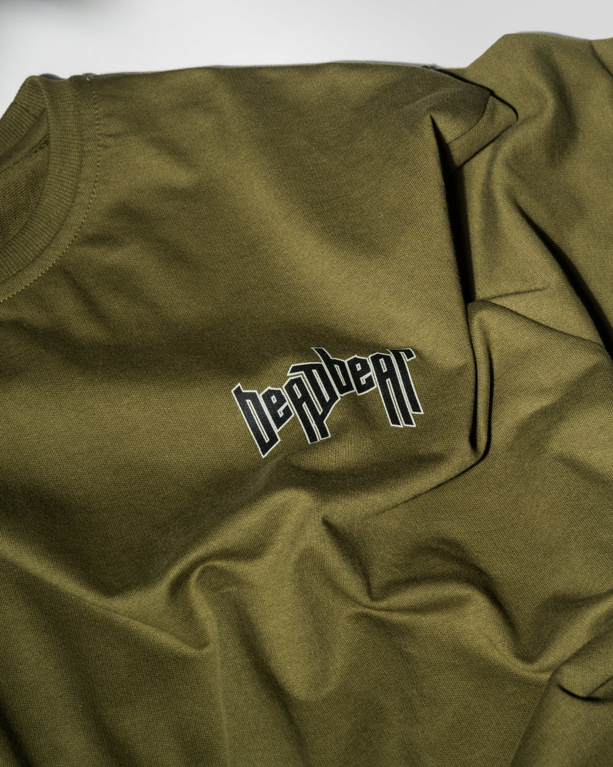 Messenger Tee Olive by DEADBEAR