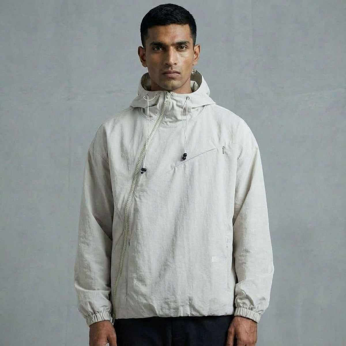 ASYMMETRIC SHELL JACKET- LIGHT GREY by GREY AREA