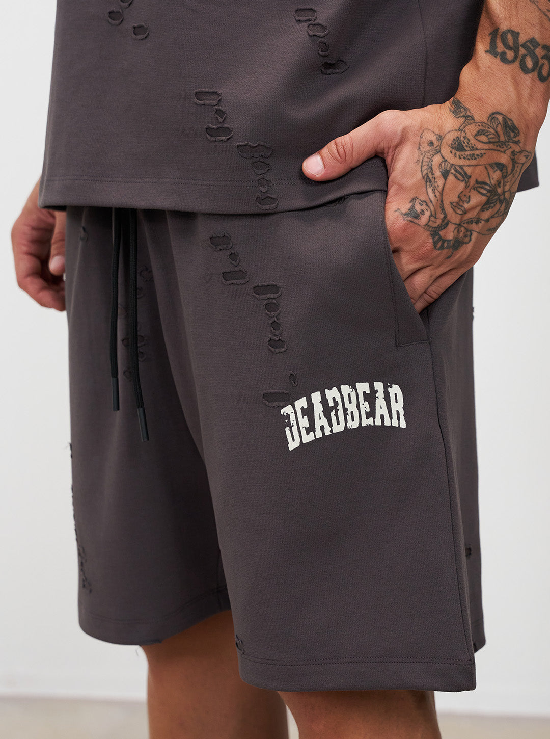 Distressed Ash Grey Shorts by DEADBEAR