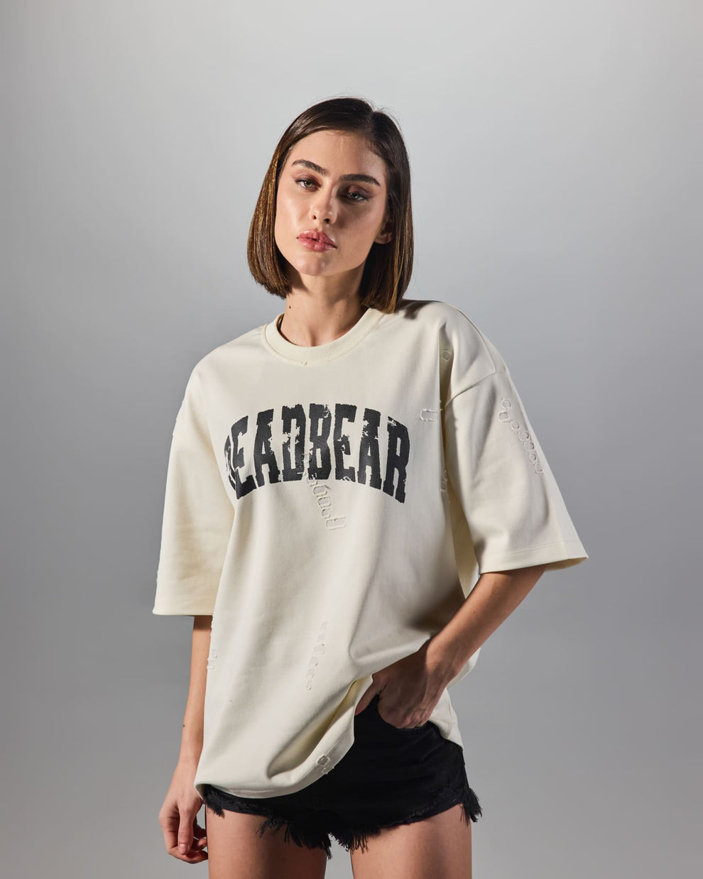 Distressed Cream White Tee by DEADBEAR