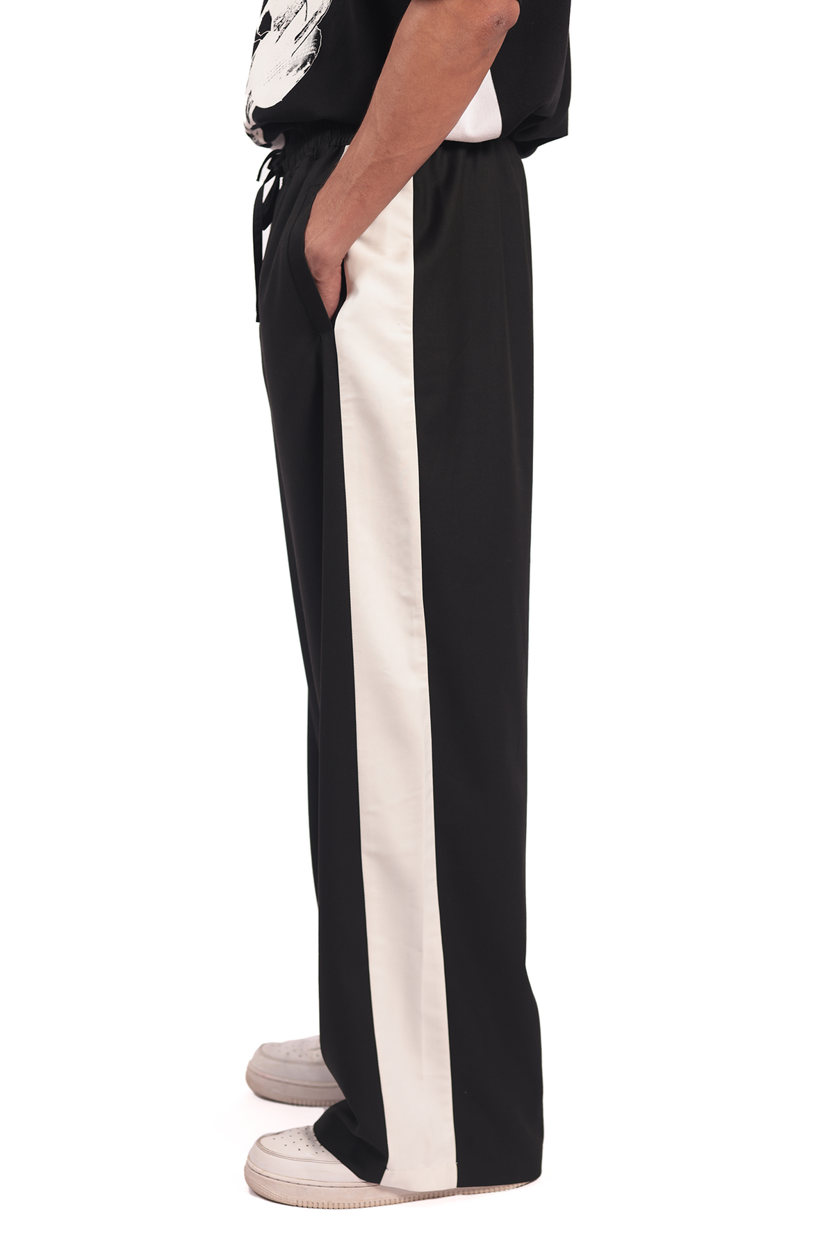 Shreyas Iyer x HUEMN embroidered trackpant with panelled detail (Black) by HUEMN