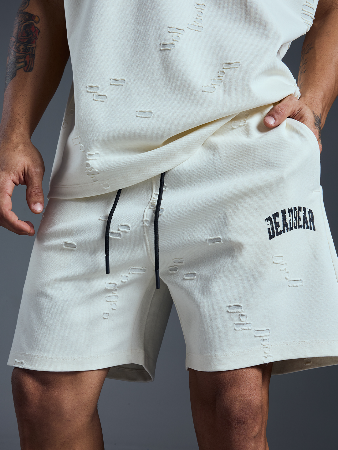 Distressed Cream White Shorts by DEADBEAR