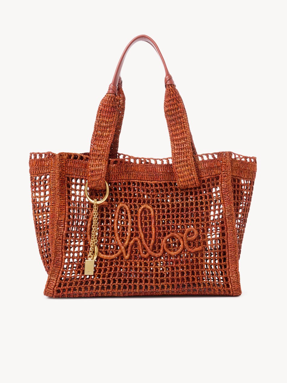 CHLOE Summer Banana east-west tote bag in raffia Clay Brown by CHLOE