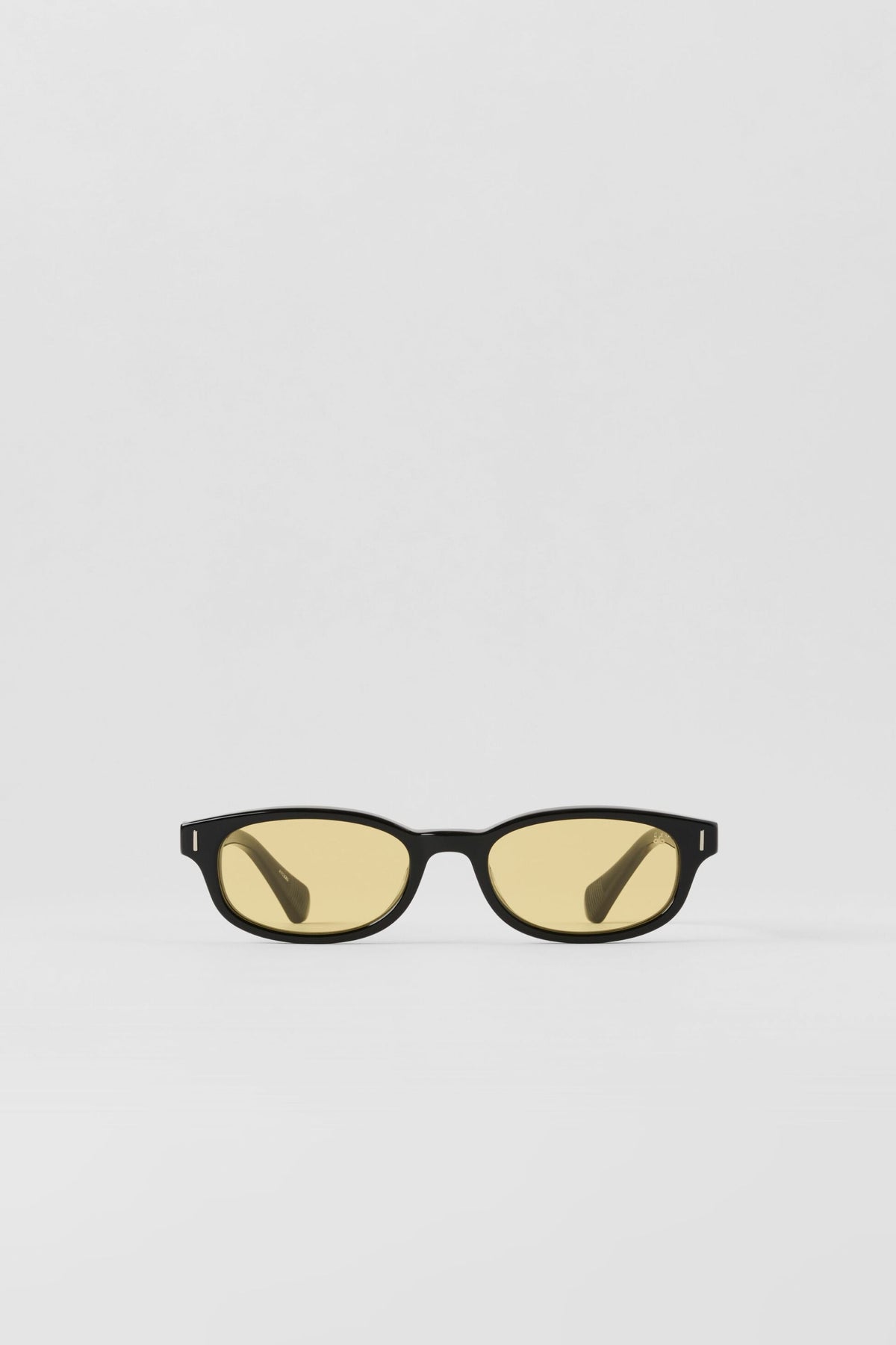 Alo Yoga Skinny Oval Sunglasses in Black/Yellow, product image 4 of 5