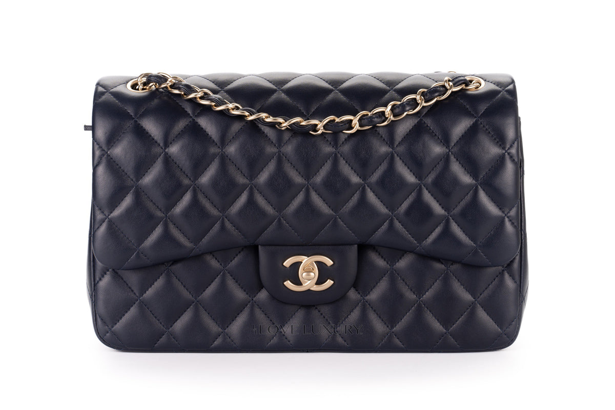 Chanel Jumbo Classic Flap Navy Caviar Champagne Hardware - view 1