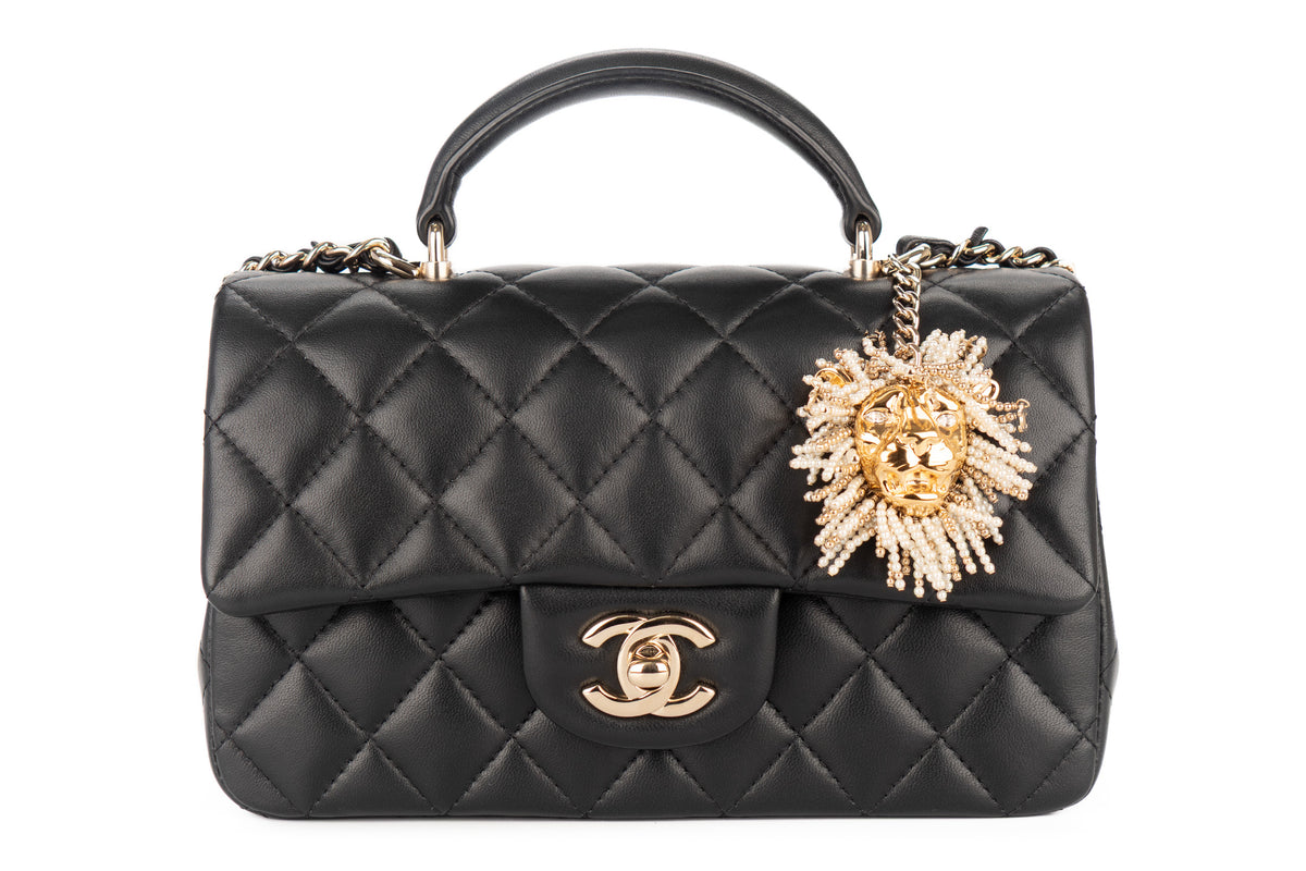 Chanel Mini Rectangular Bag Quilted Top Handle Pearl Crystal Lion Charm Black Lambskin Champagne Hardware - view 1