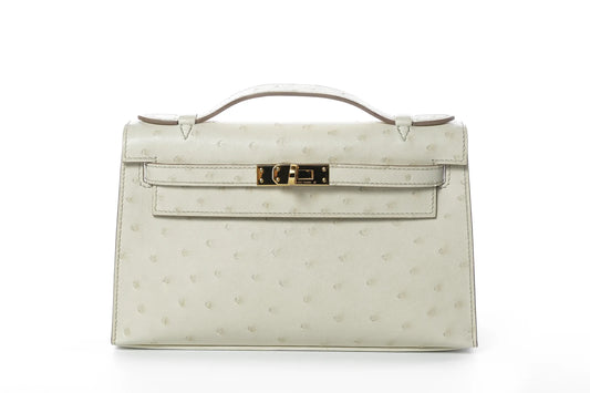 Hermès Kelly Pochette 22 – Ostrich Beton with Gold Hardware - Zeuskicks