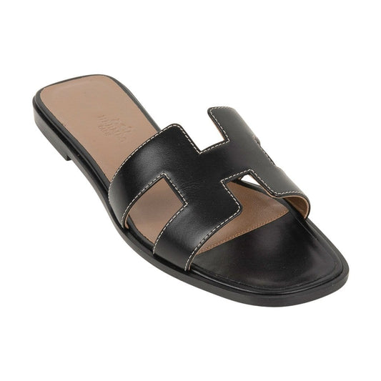 Hermès Oran Sandals – Black Calfskin with White Top Stitch