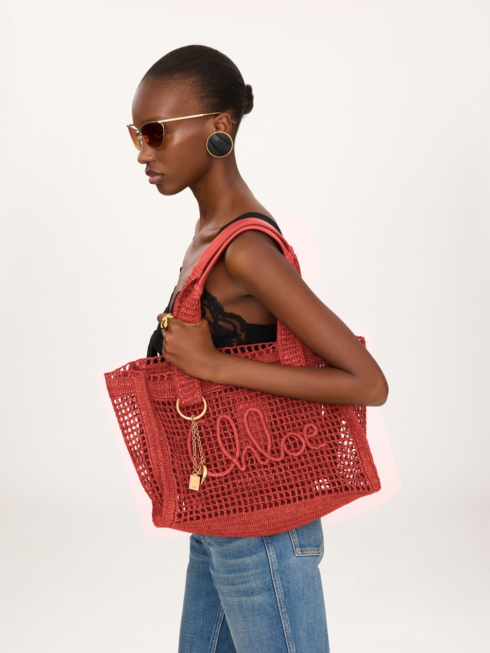 CHLOE Summer Banana east-west tote bag in raffia Camellia Coral by CHLOE