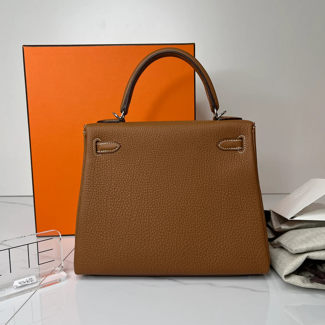 Hermès Kelly 25 – Gold Togo with Palladium Hardware (PHW) - Zeuskicks