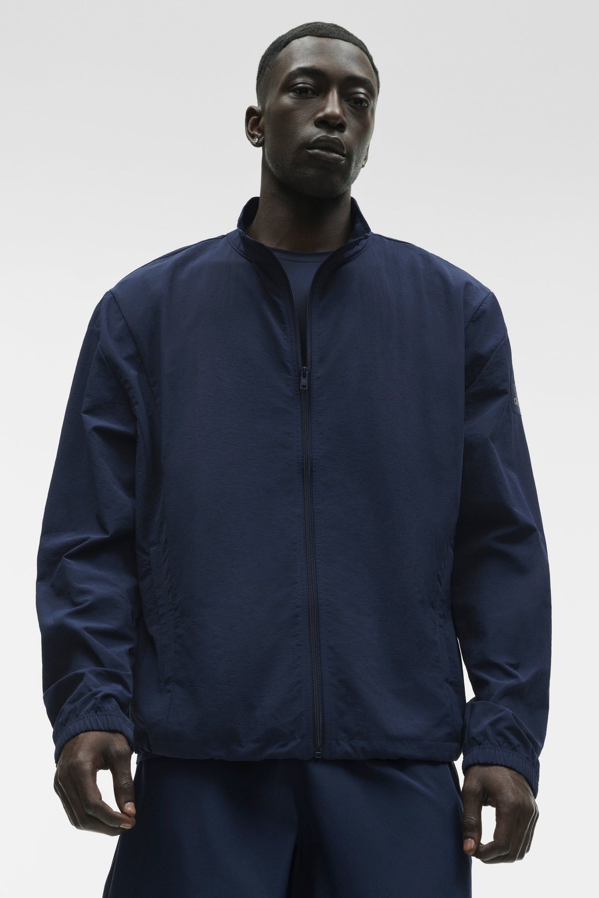 Alo Yoga Takeaway Track Full Zip Jacket in Navy, product image 3 of 6