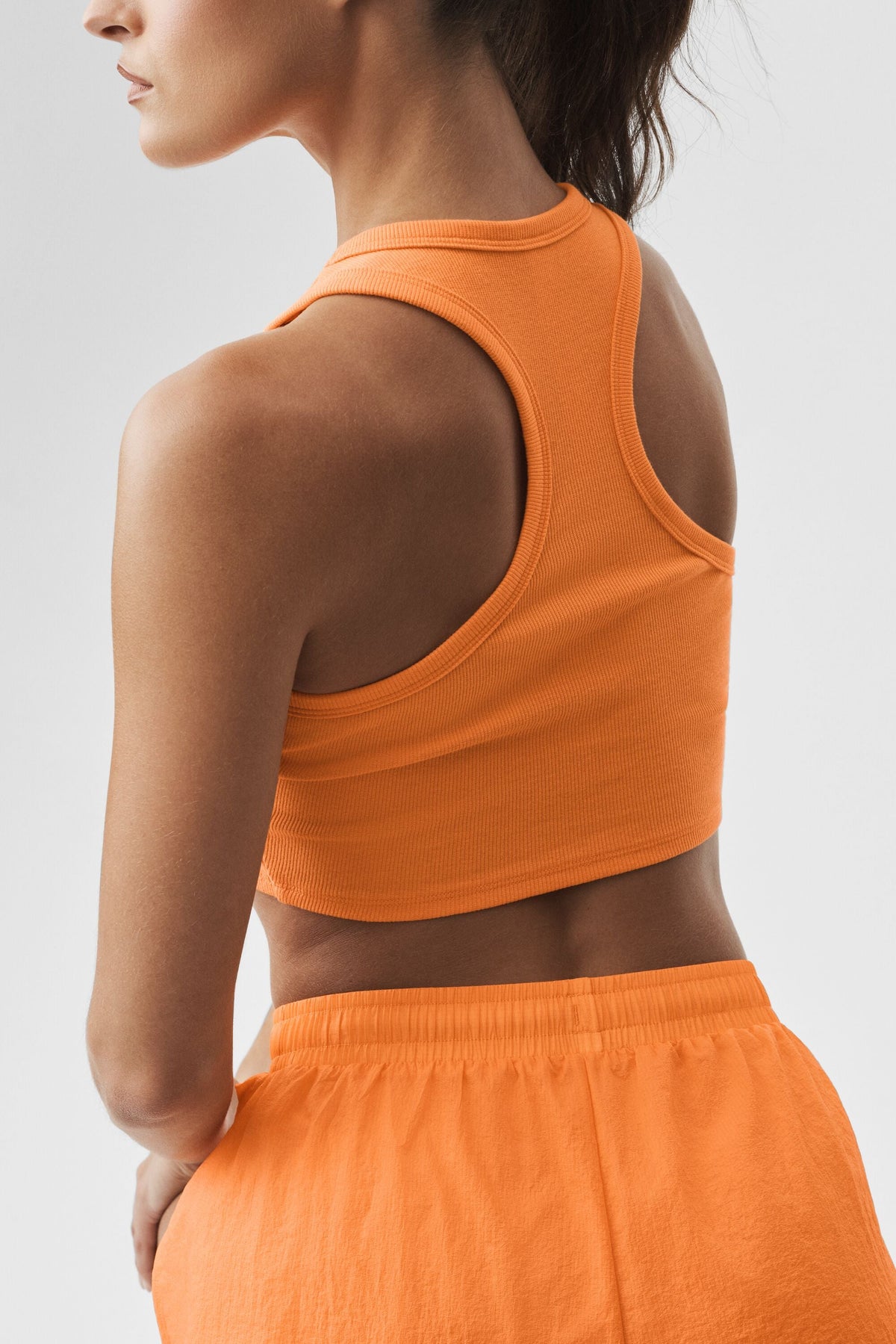 Alo Yoga Aspire Tank in Satsuma Breeze/White, product image 2 of 5