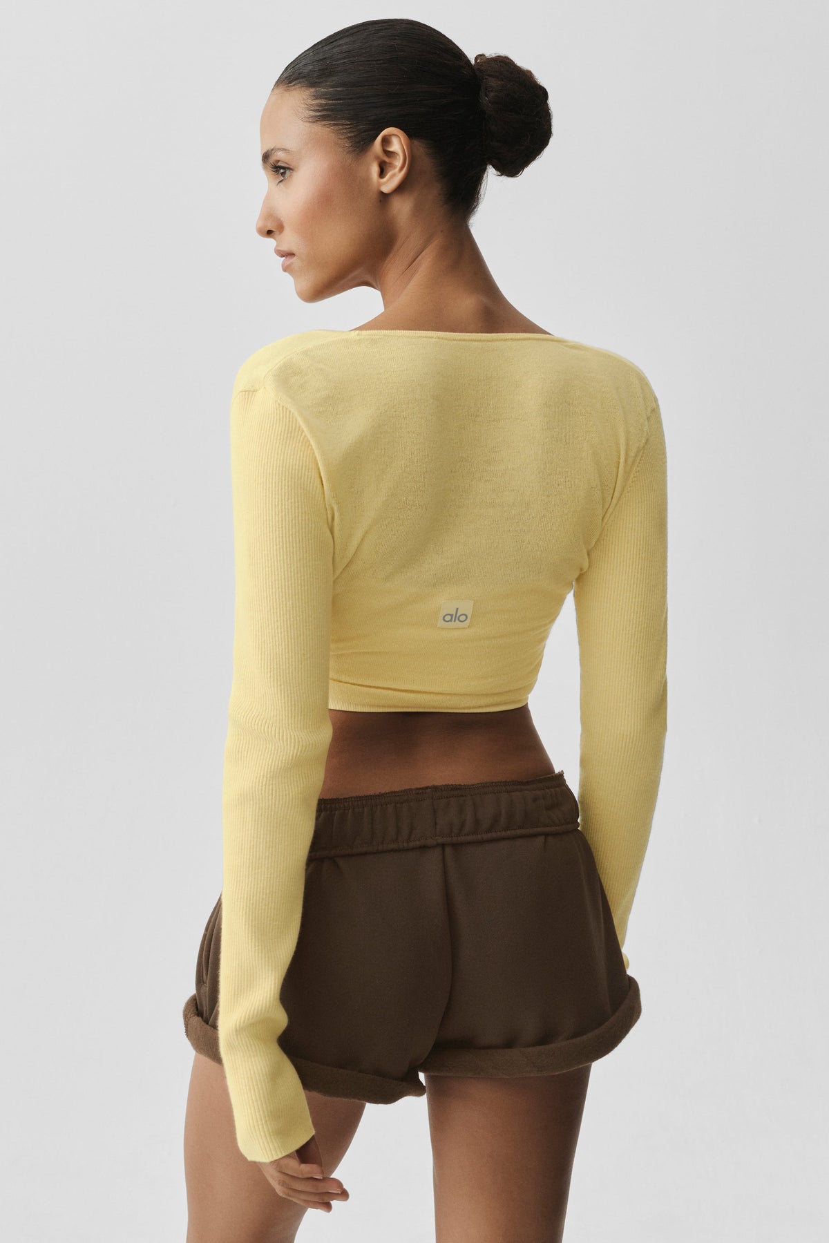 Alo Yoga Sweater Knit Crossover Long Sleeve in Warm Butter, product image 2 of 4