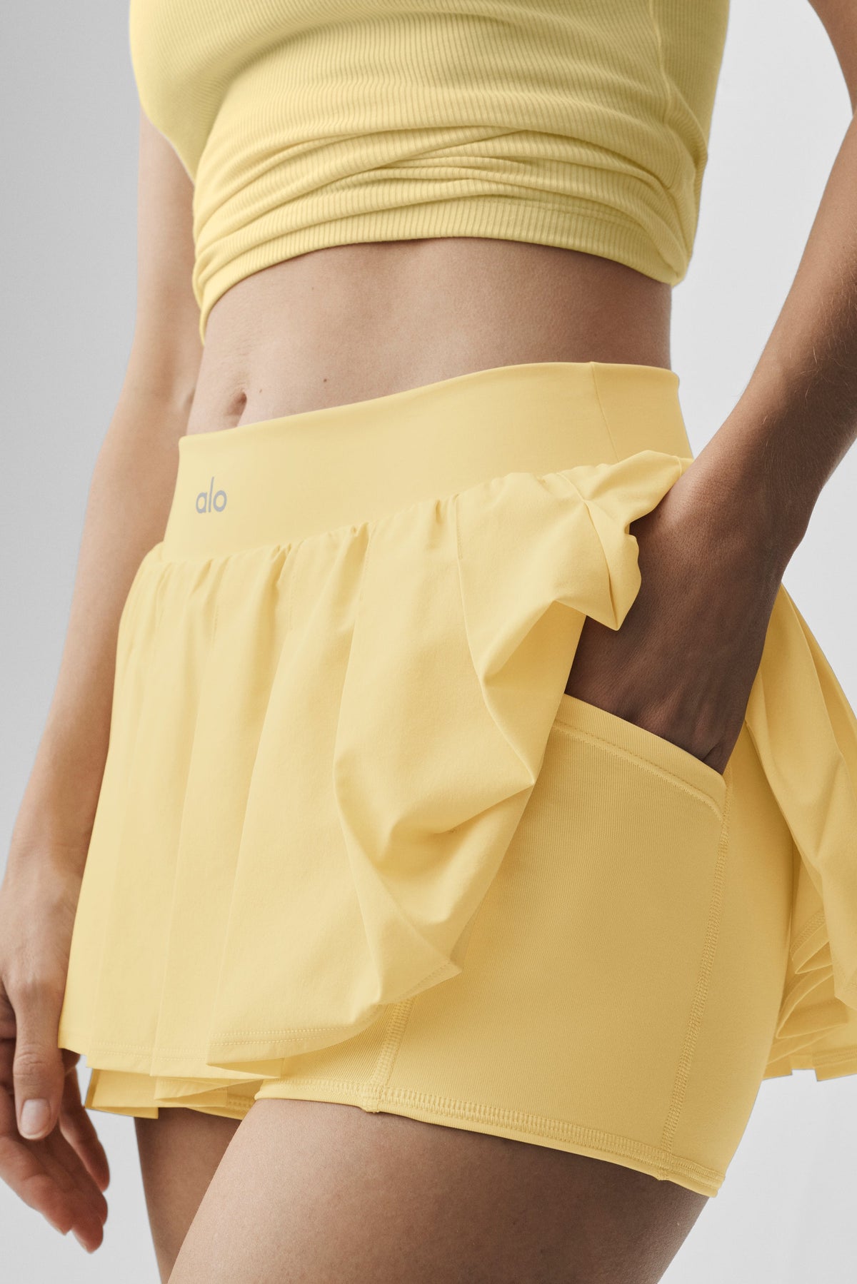 Alo Yoga Double Or Nothing Tennis Skirt in Warm Butter, product image 3 of 4