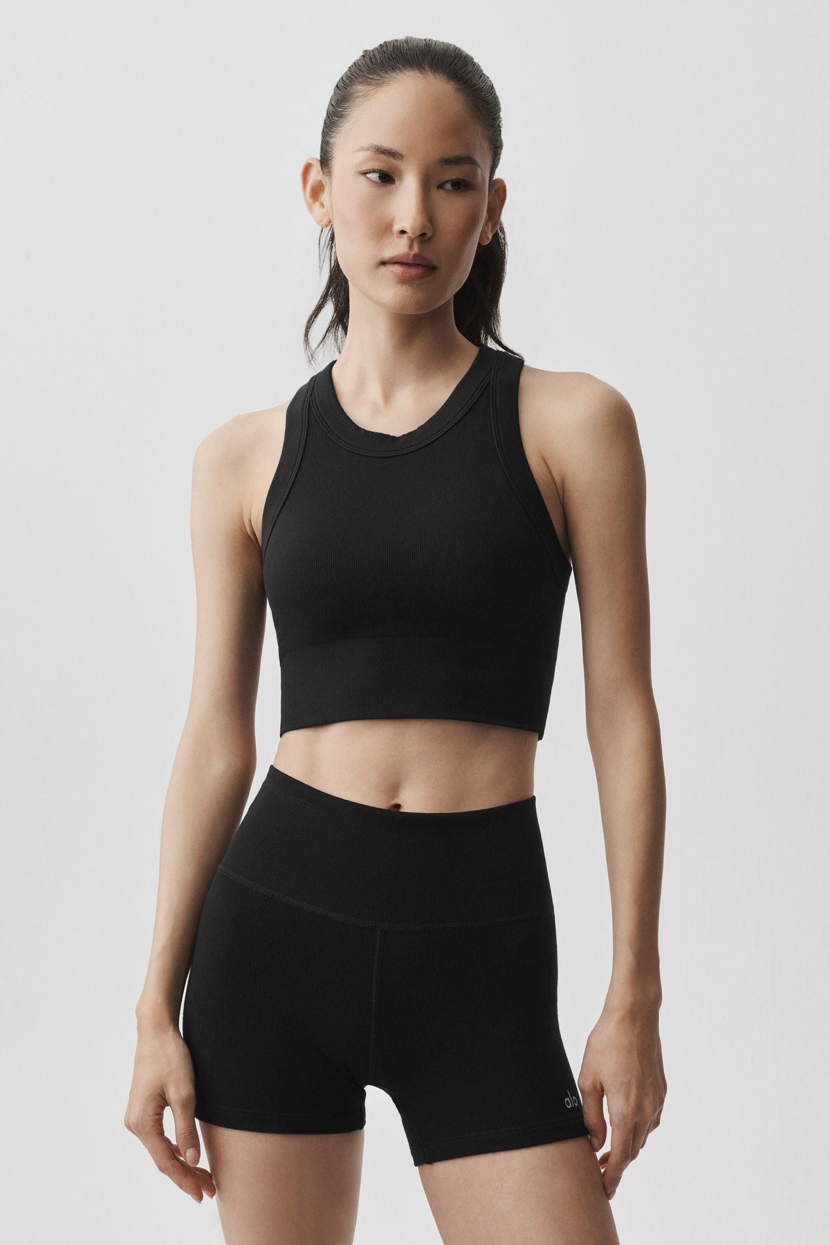 Alo Yoga Seamless Modal Ribbed High Neck Delight Bra in Black