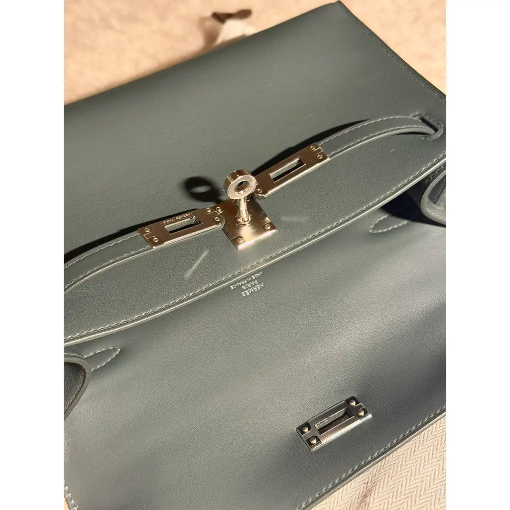 Hermès Kelly Pochette – Swift Leather Clutch in Vert Mangrove