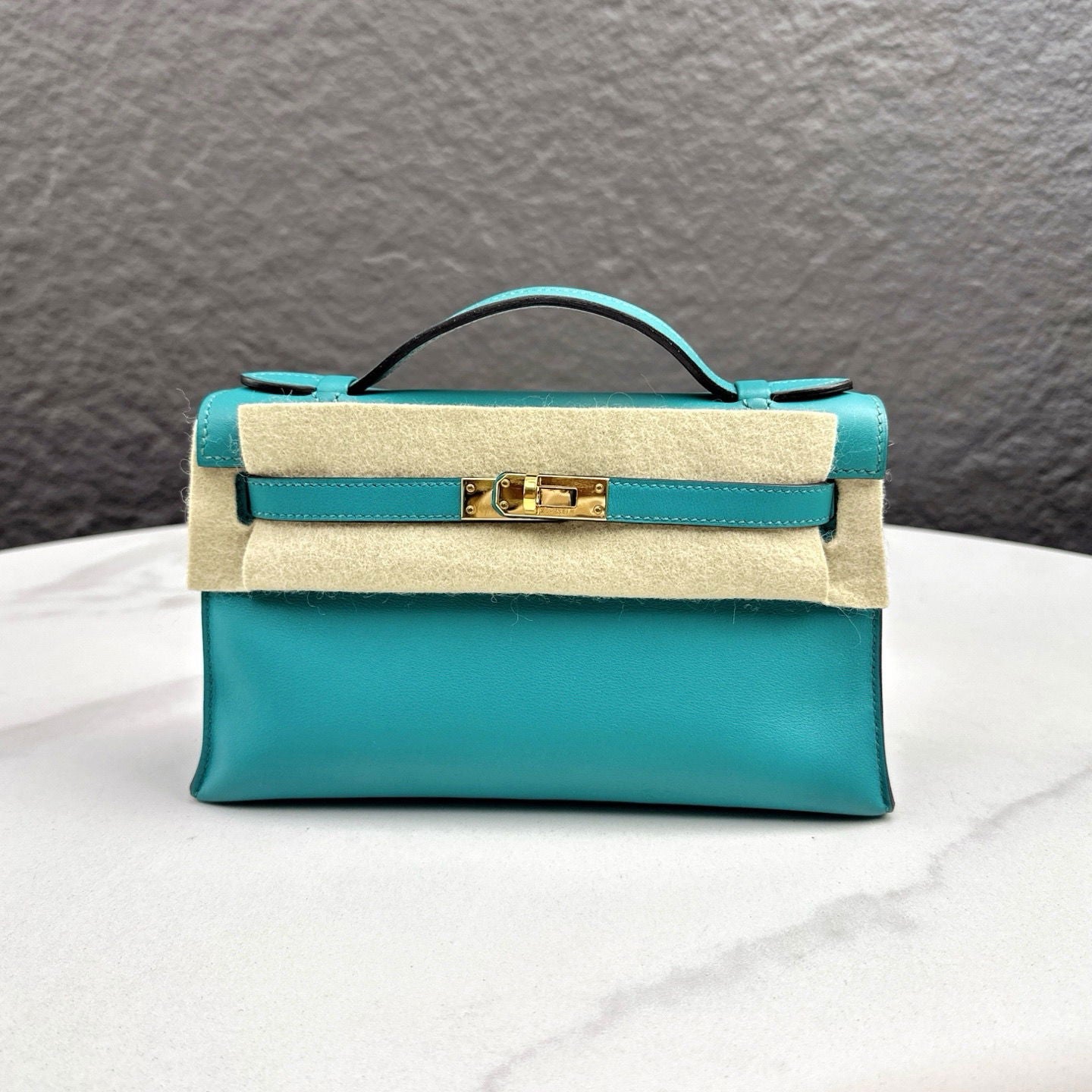 Hermès Kelly Pochette Swift 7F Bleu Paon