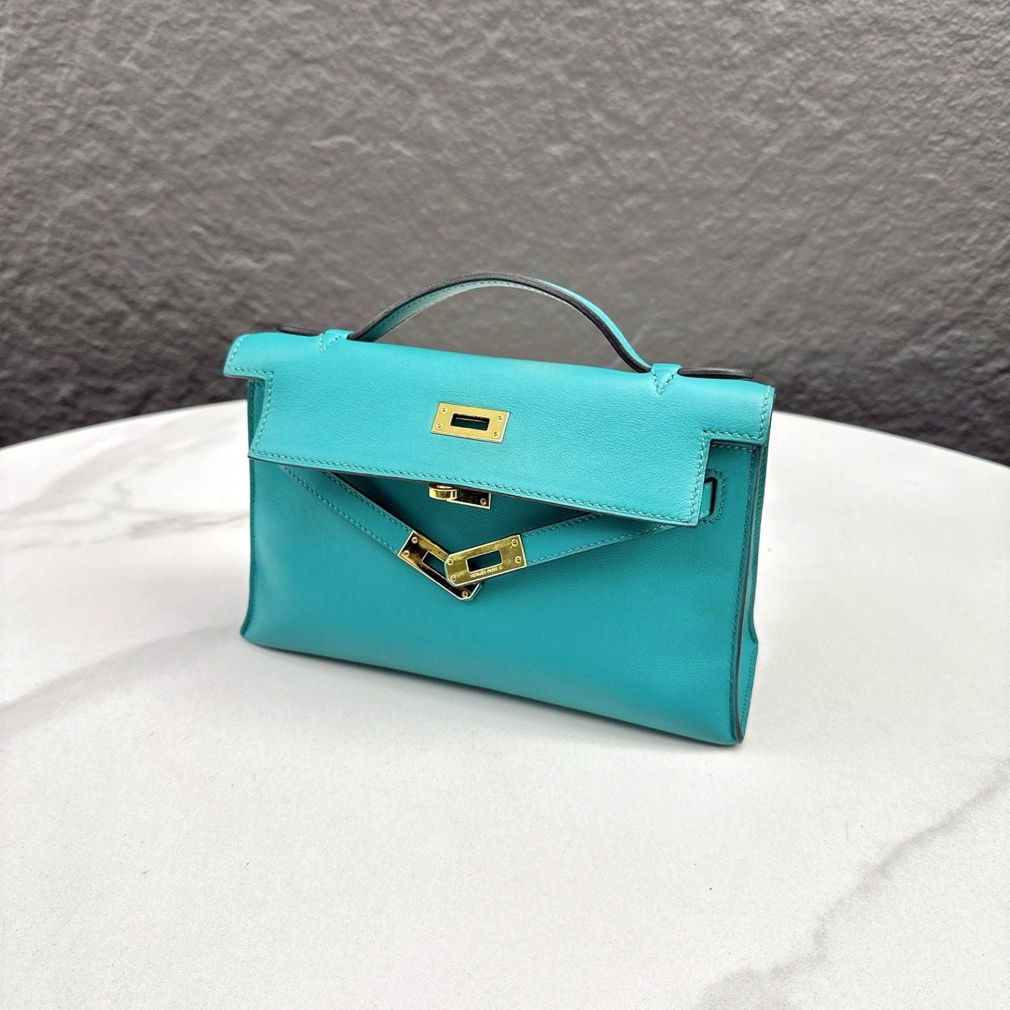 Hermès Kelly Pochette Swift 7F Bleu Paon