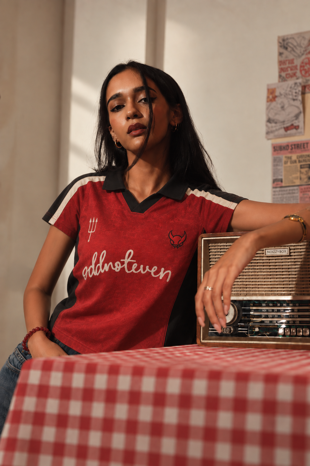 Red Devils Retro Baby Tee by oddnoteven