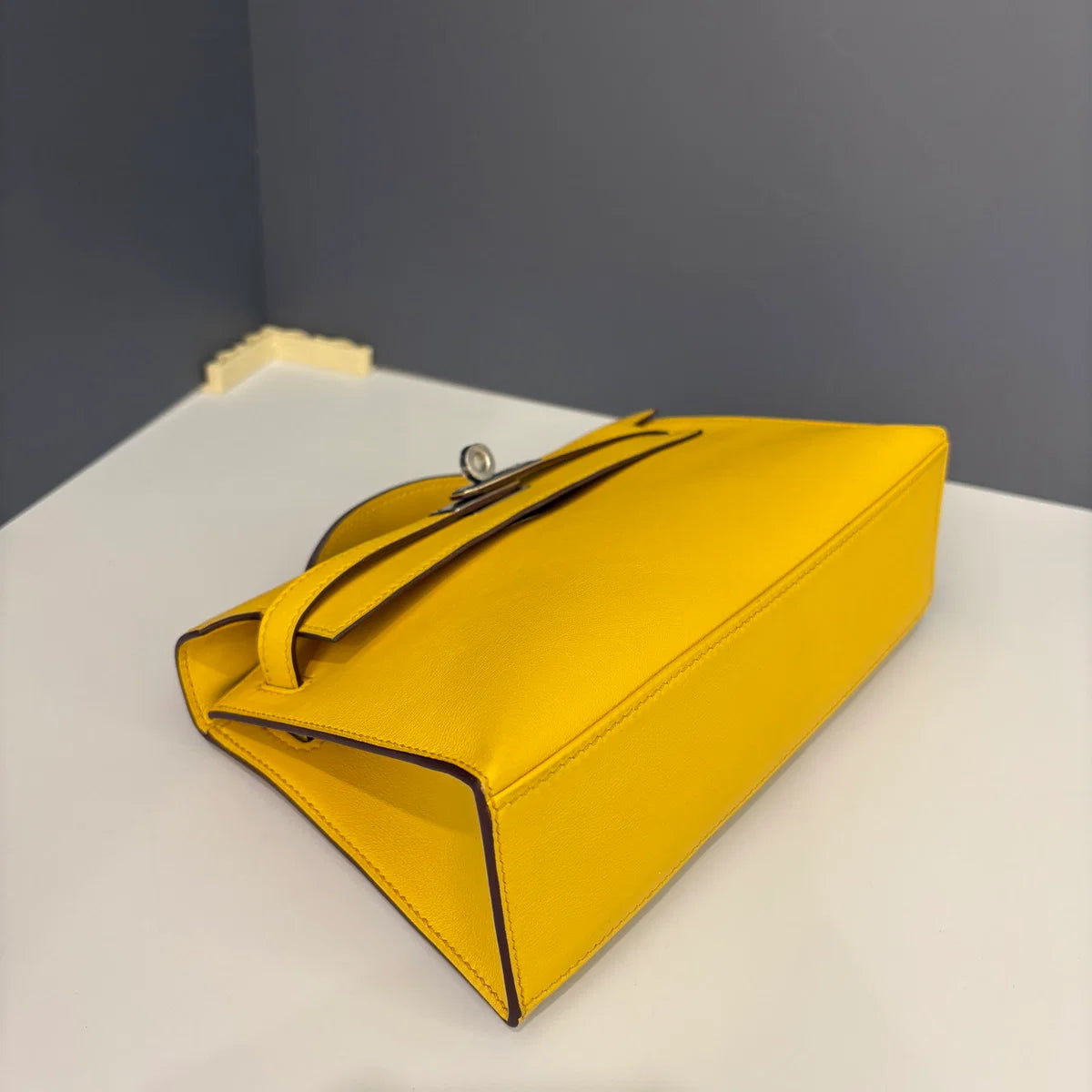 Hermès Kelly Pochette Swift 9D Jaune Amber
