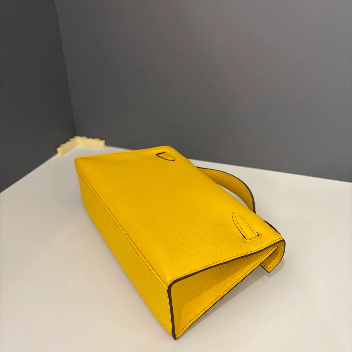 Hermès Kelly Pochette Swift 9D Jaune Amber