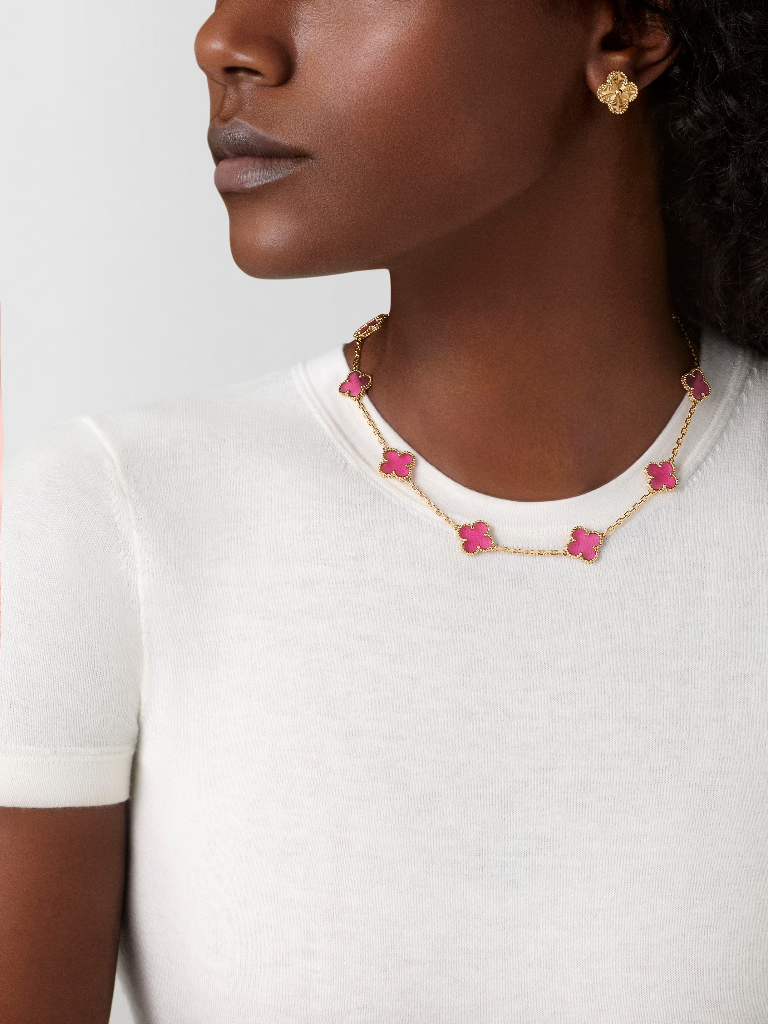 Vintage Alhambra necklace, 10 motifs in pink enamel and 18K yellow gold, worn view